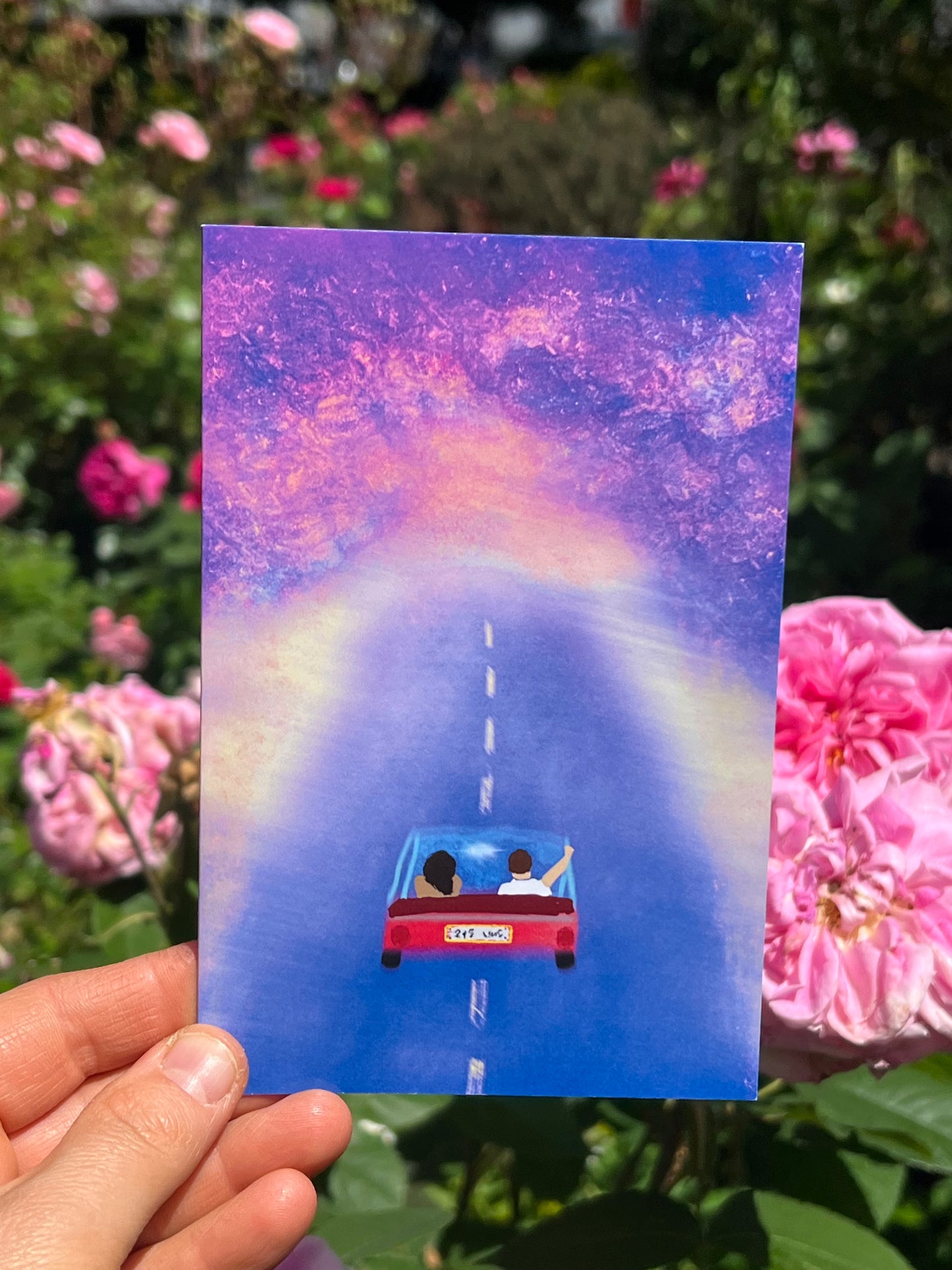 Lovers in Red Car – Retro Galaxy Greeting Card